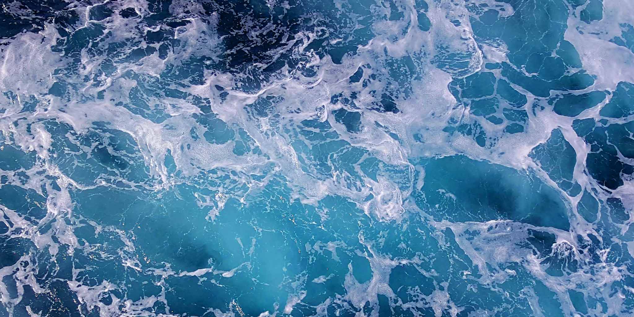 Gorgeous, swirling blue ocean water, as seen from above
